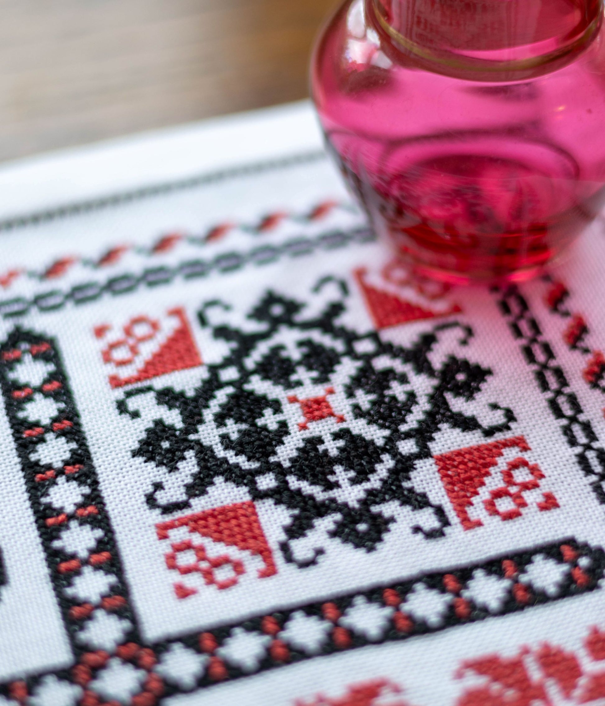 cross stitch folk embroidery with romanian motifs