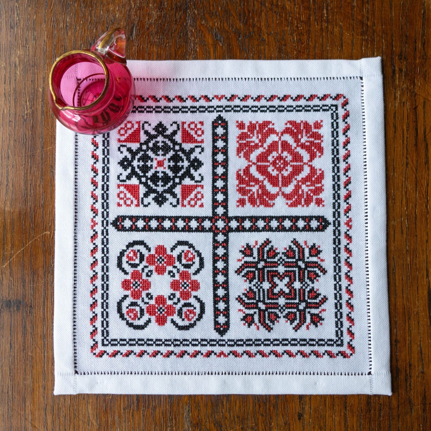 cross stitch folk embroidery with romanian motifs