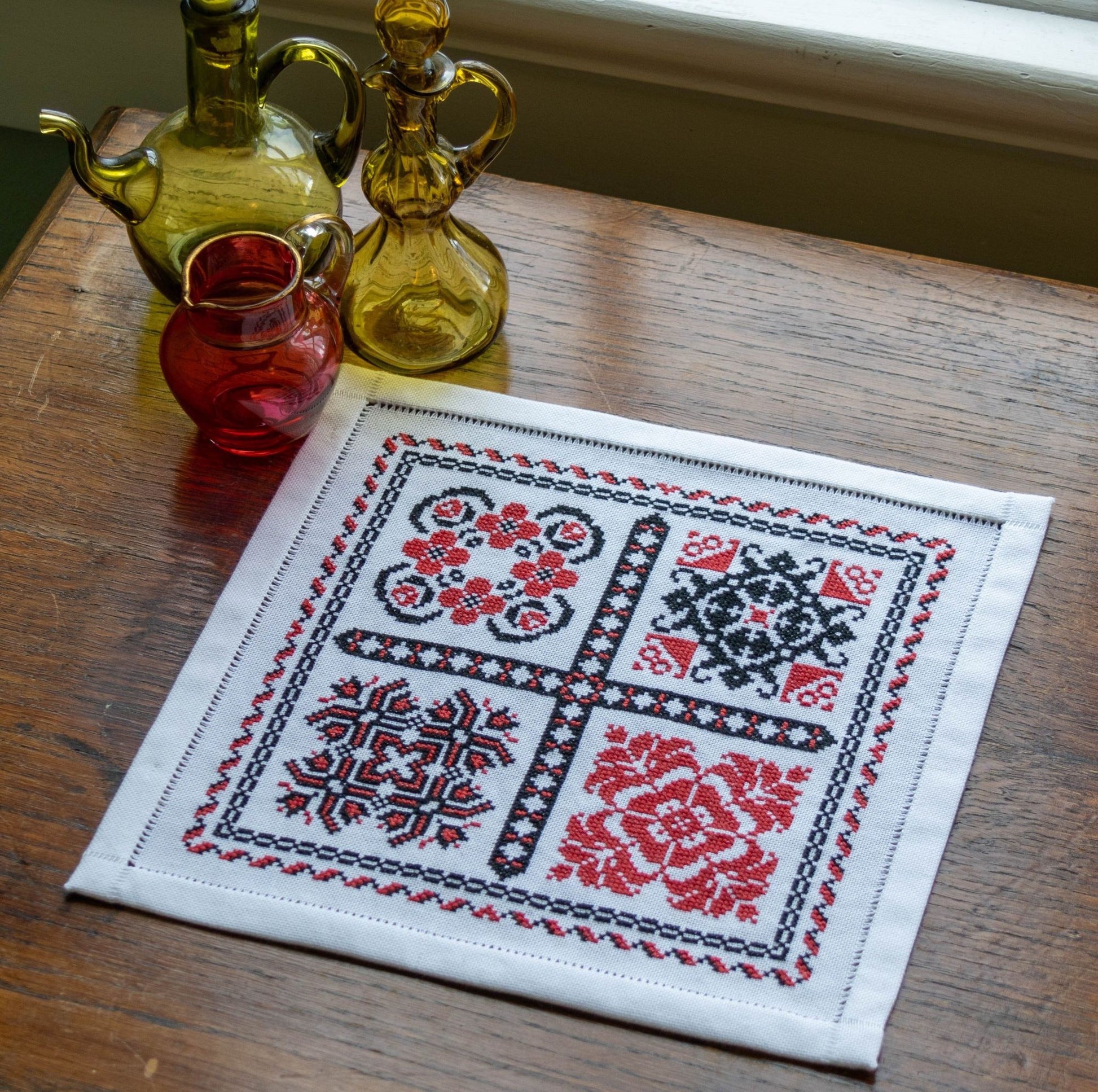 cross stitch folk embroidery with romanian motifs