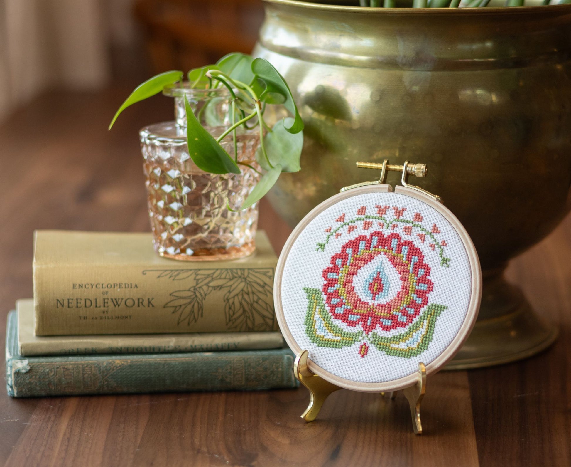 cross stitch folk embroidery flower in hoop