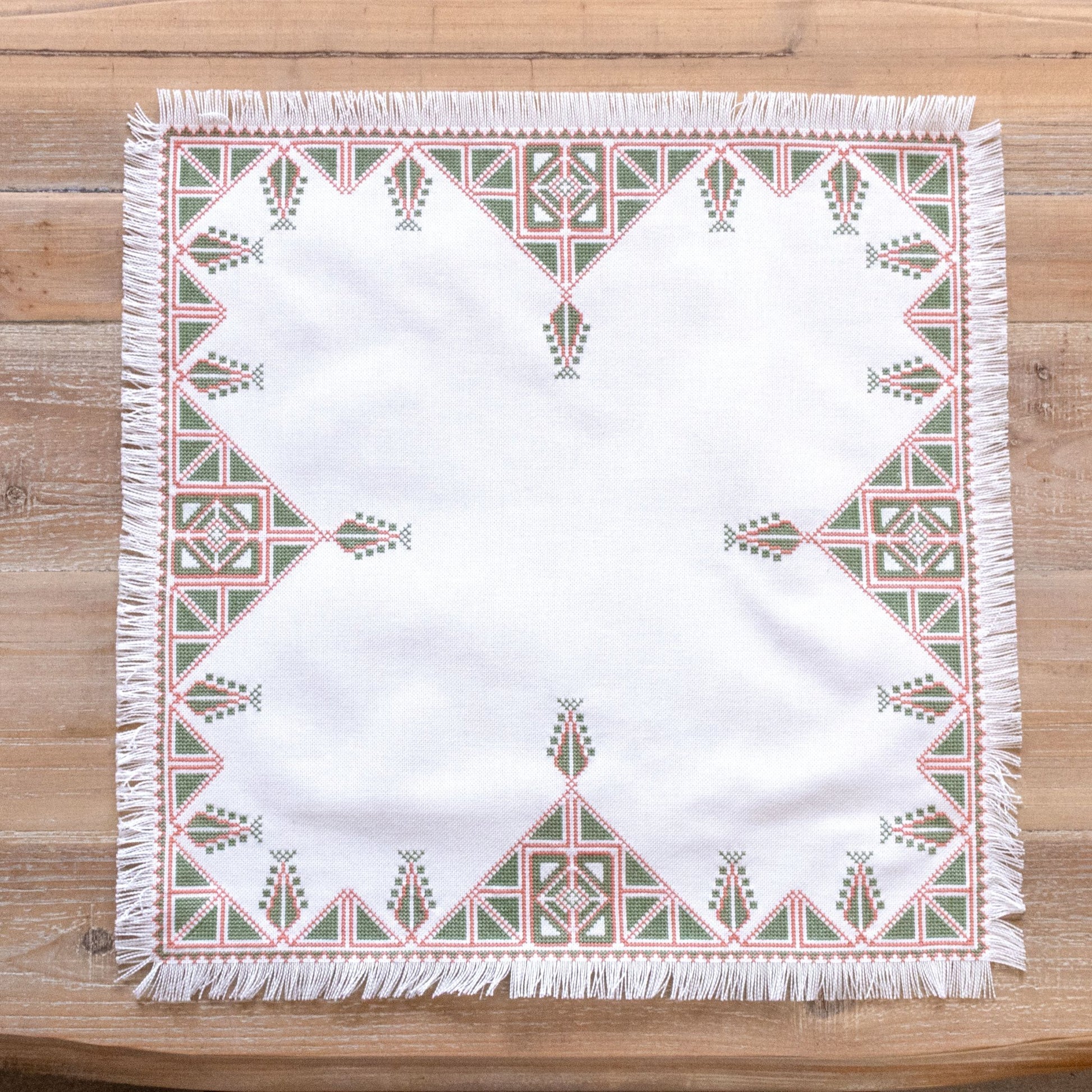 Greek cross stitch folk embroidery tree design on table