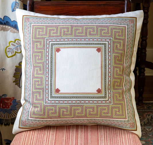 folk embroidery cushion with meander design