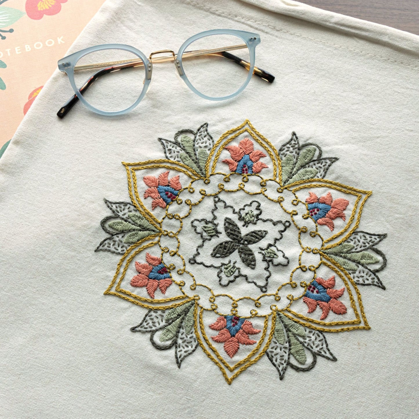 muslin bag with embroidered floral design