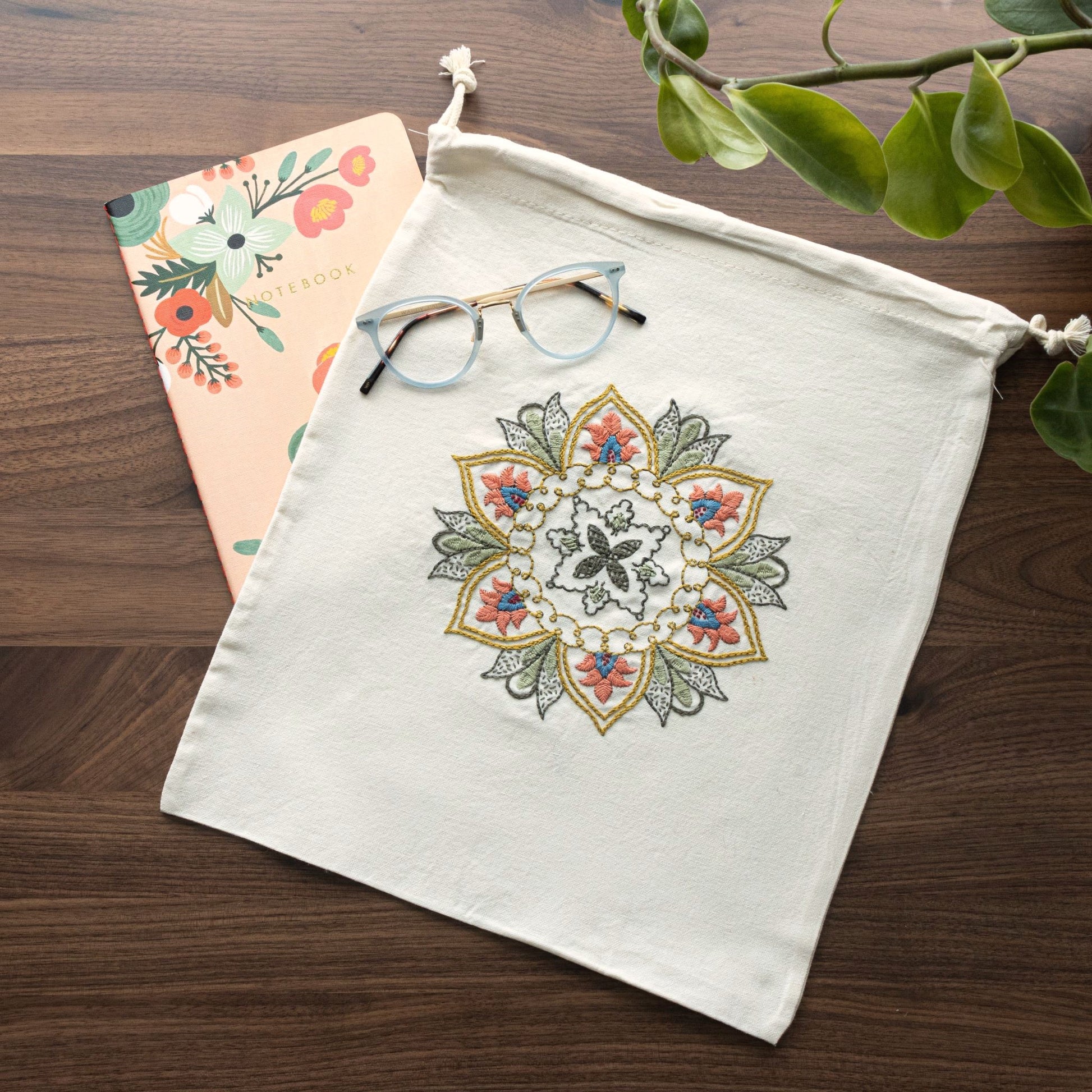 muslin bag with embroidered floral design