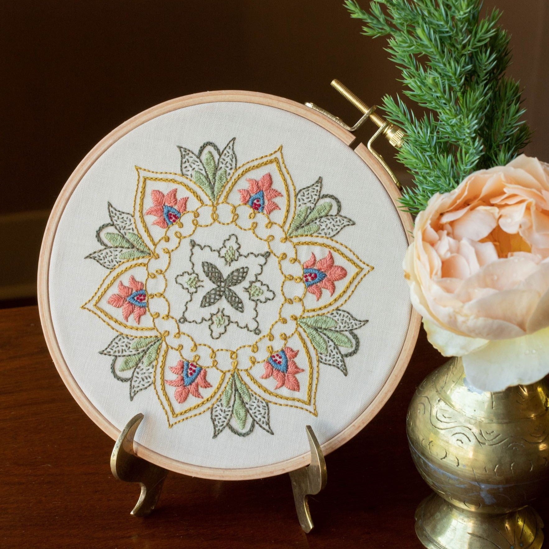 embroidery with floral design in pink