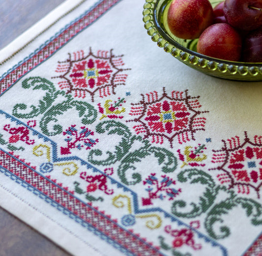 cross stitch folk embroidery table runner with red flowers