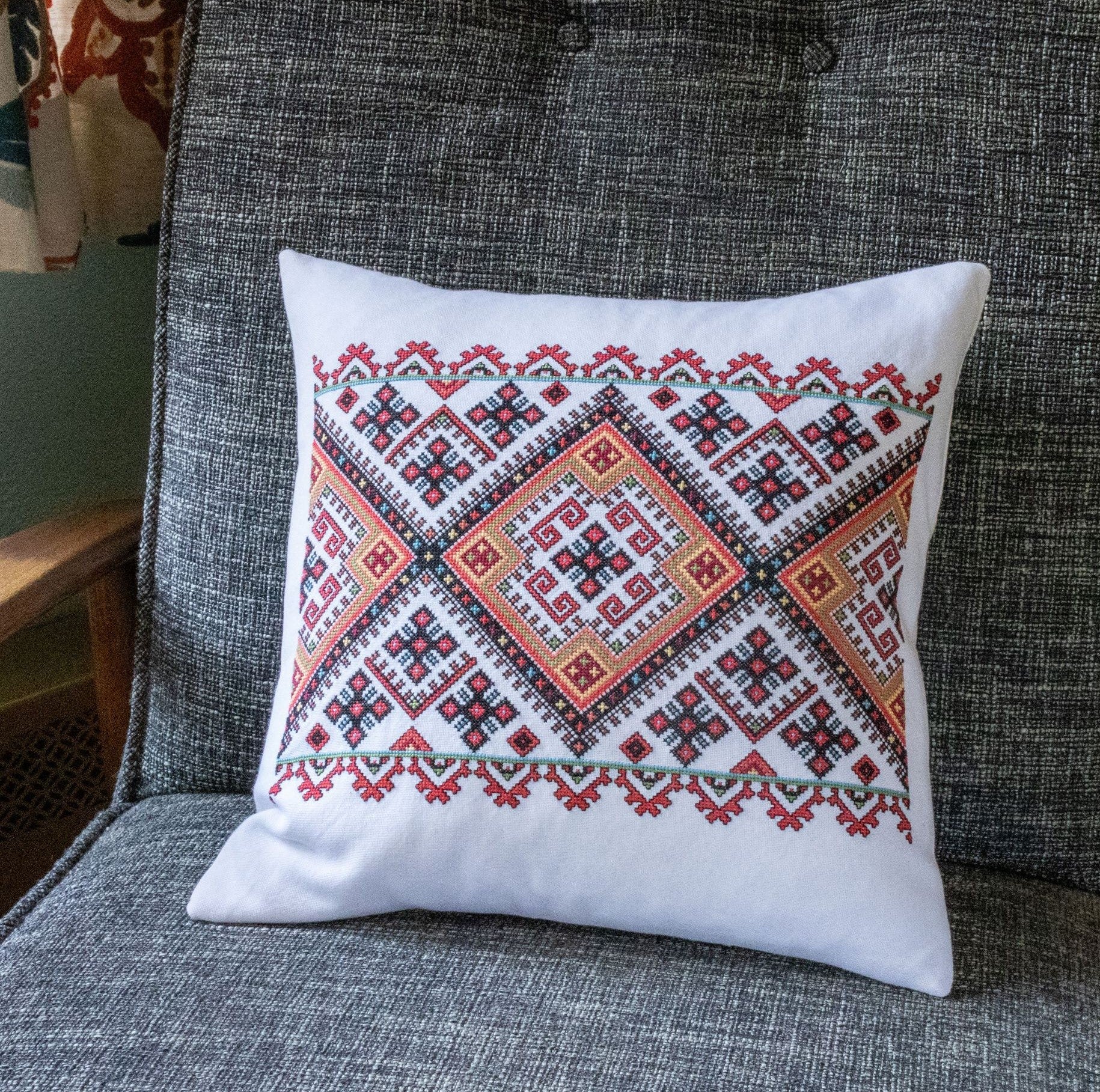 cushion with Ukrainian cross stitch folk embroidery design