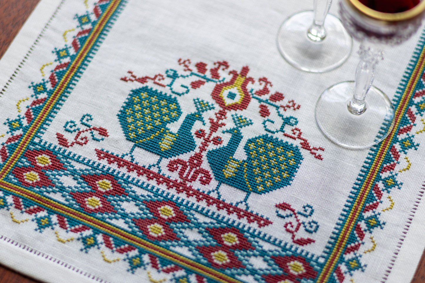 cross stitch folk embroidery table runner with peacocks