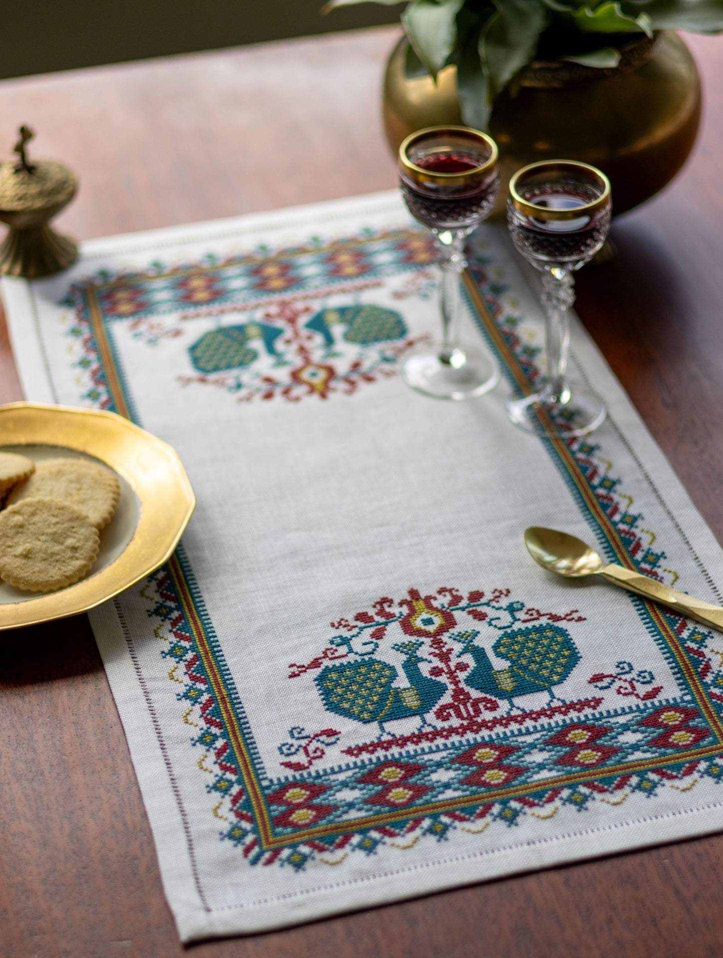 cross stitch folk embroidery table runner with peacocks