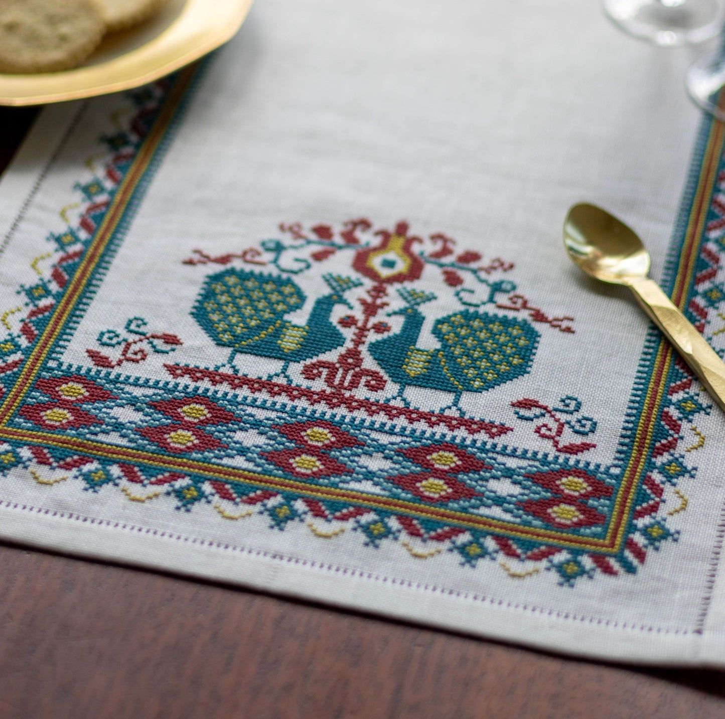 cross stitch folk embroidery table runner with peacocks