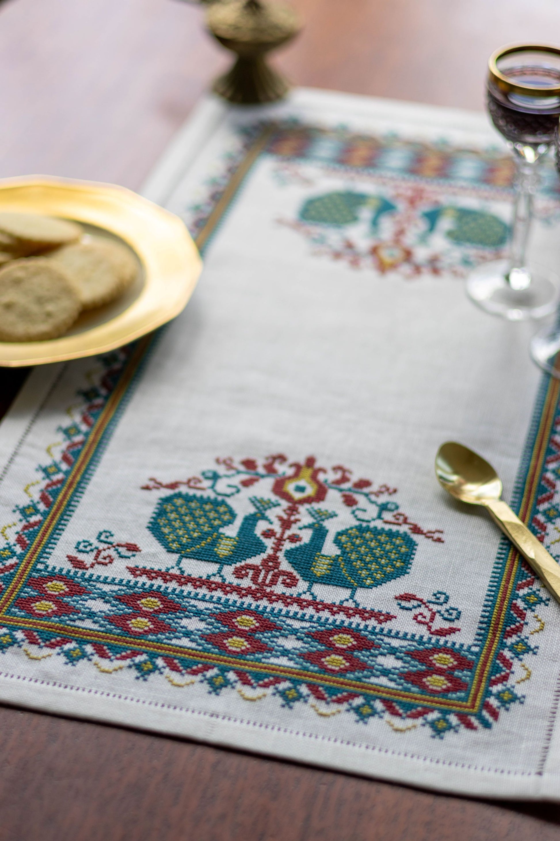 cross stitch folk embroidery table runner with peacocks