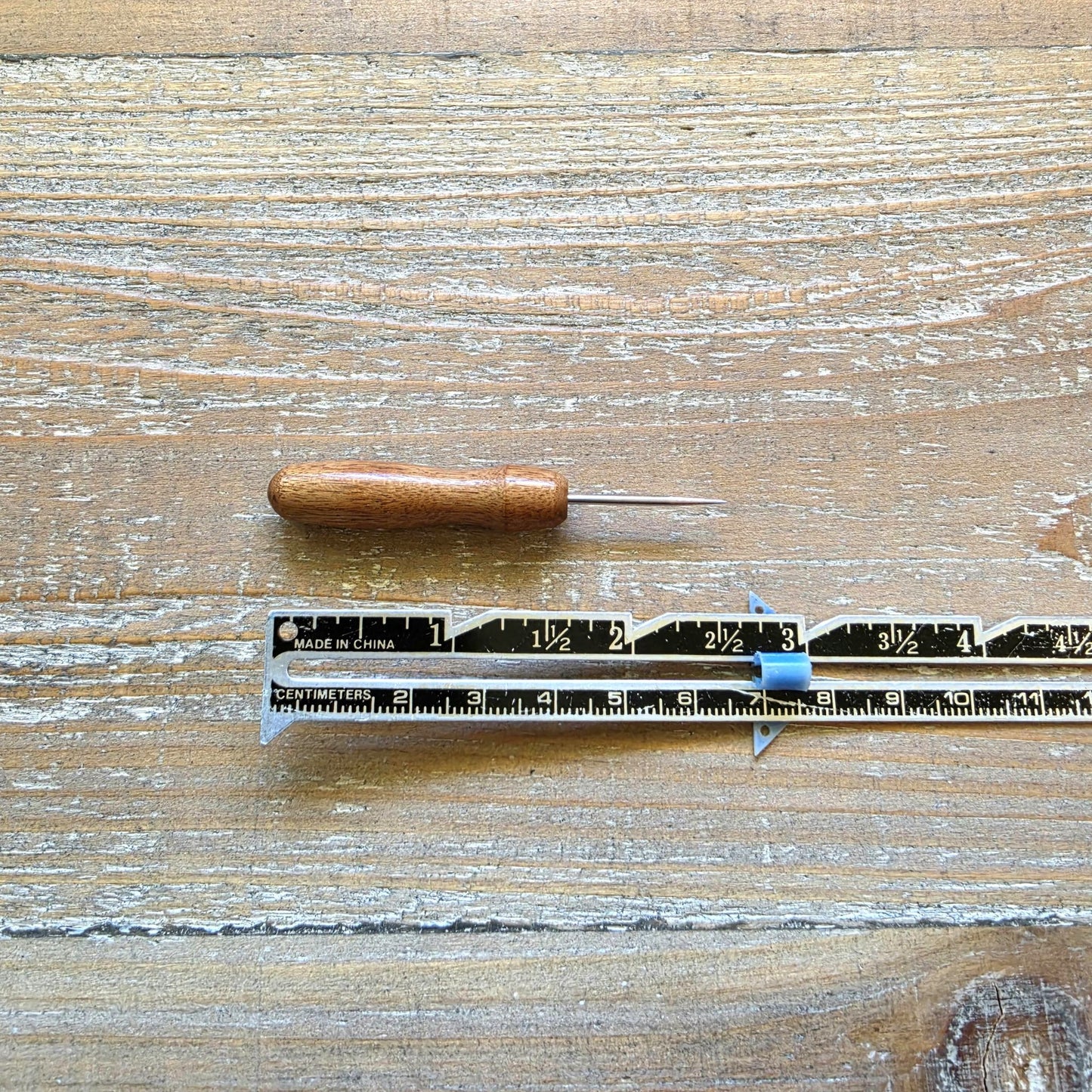 Mini awl with rosewood handle